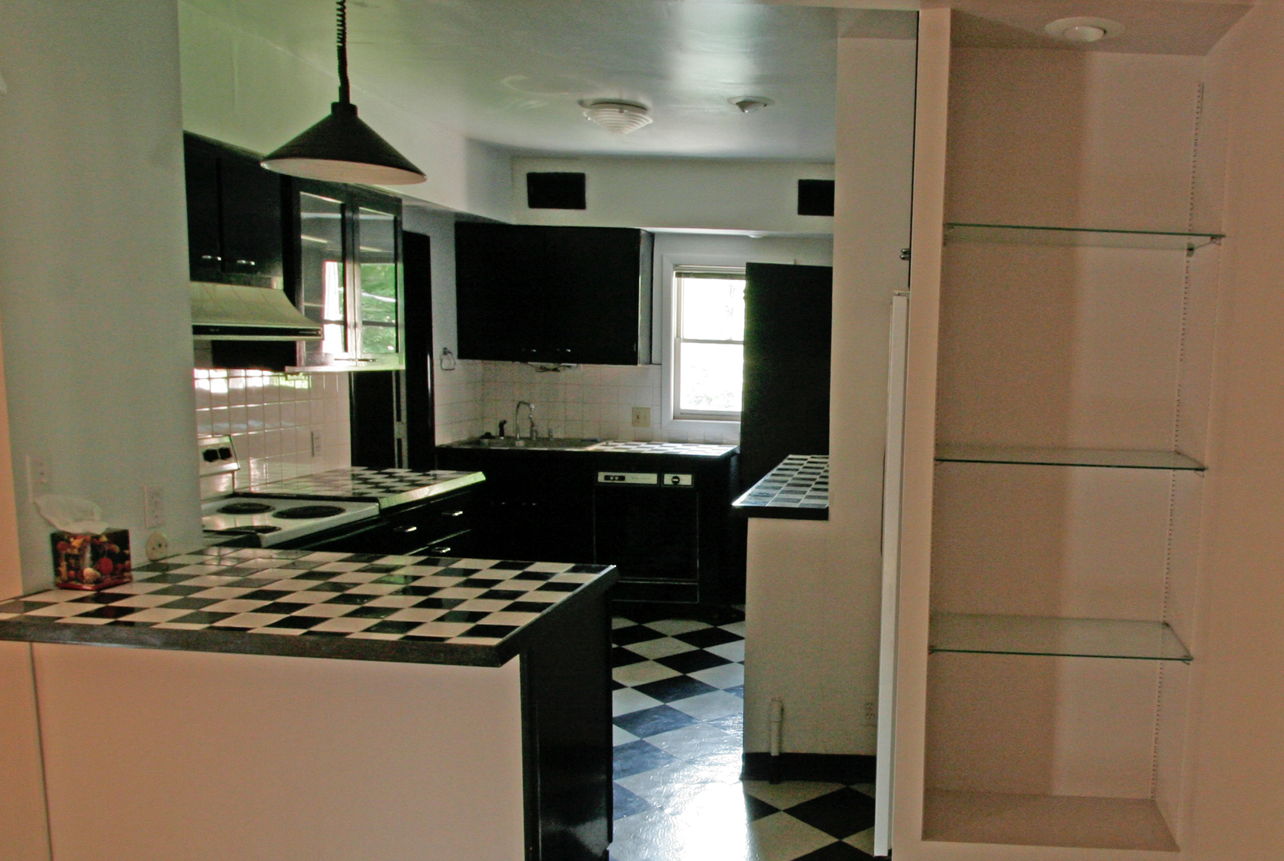 A view of the upstairs kitchen, before.