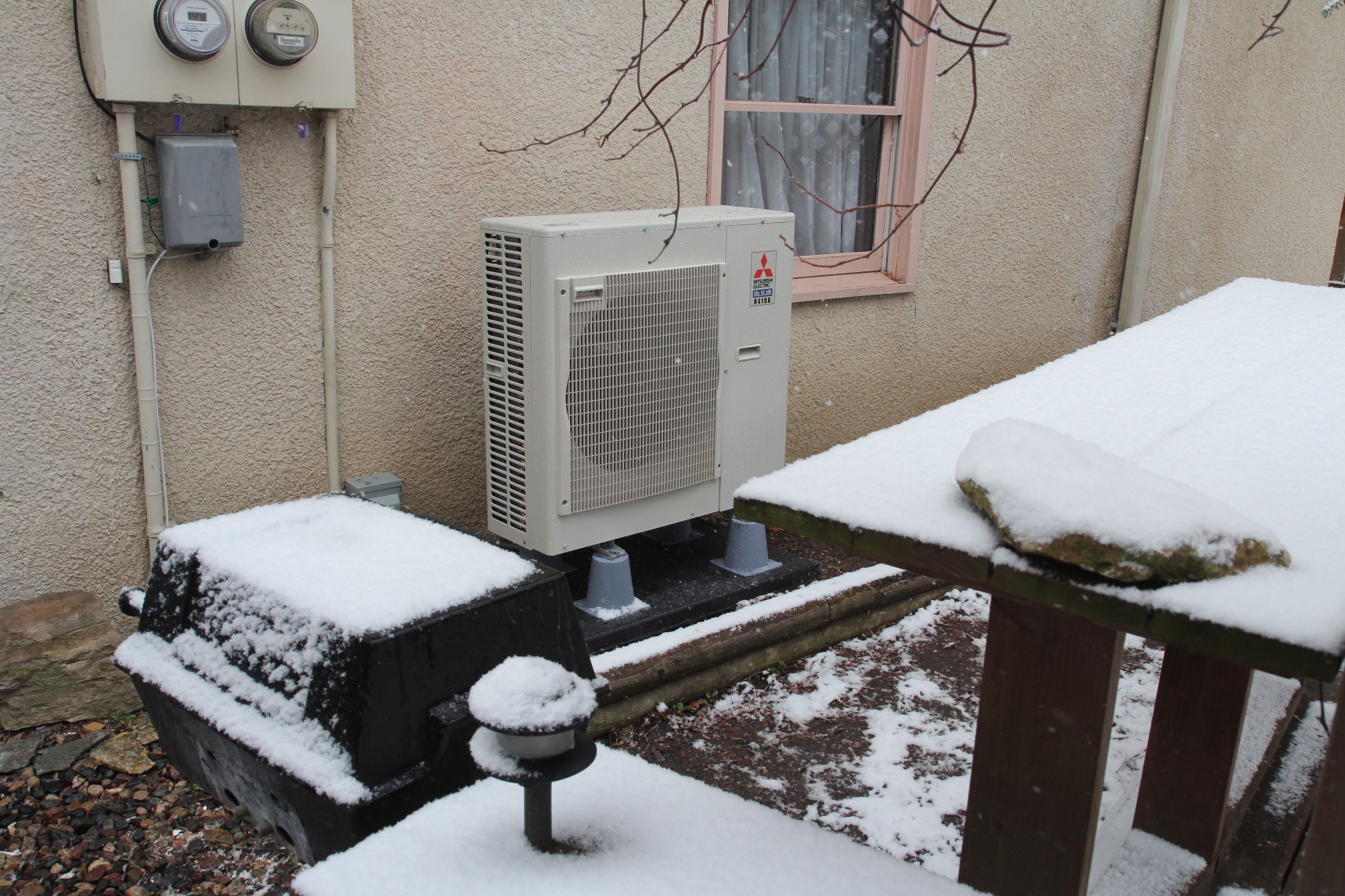 Air conditioning compressor, ready and waiting for the May snowstorms to retreat.